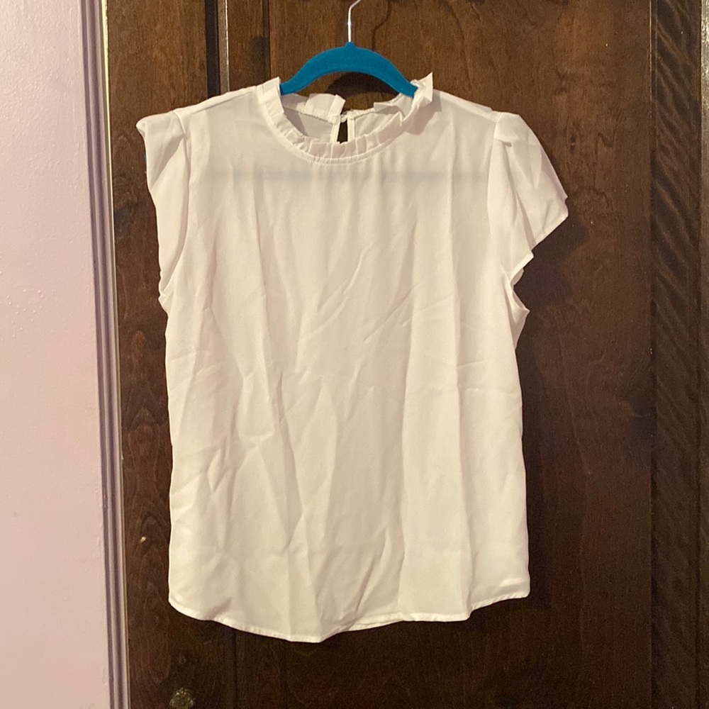White, ruffle neck women’s blouse, size large. New, but from Amazon, so no tags.